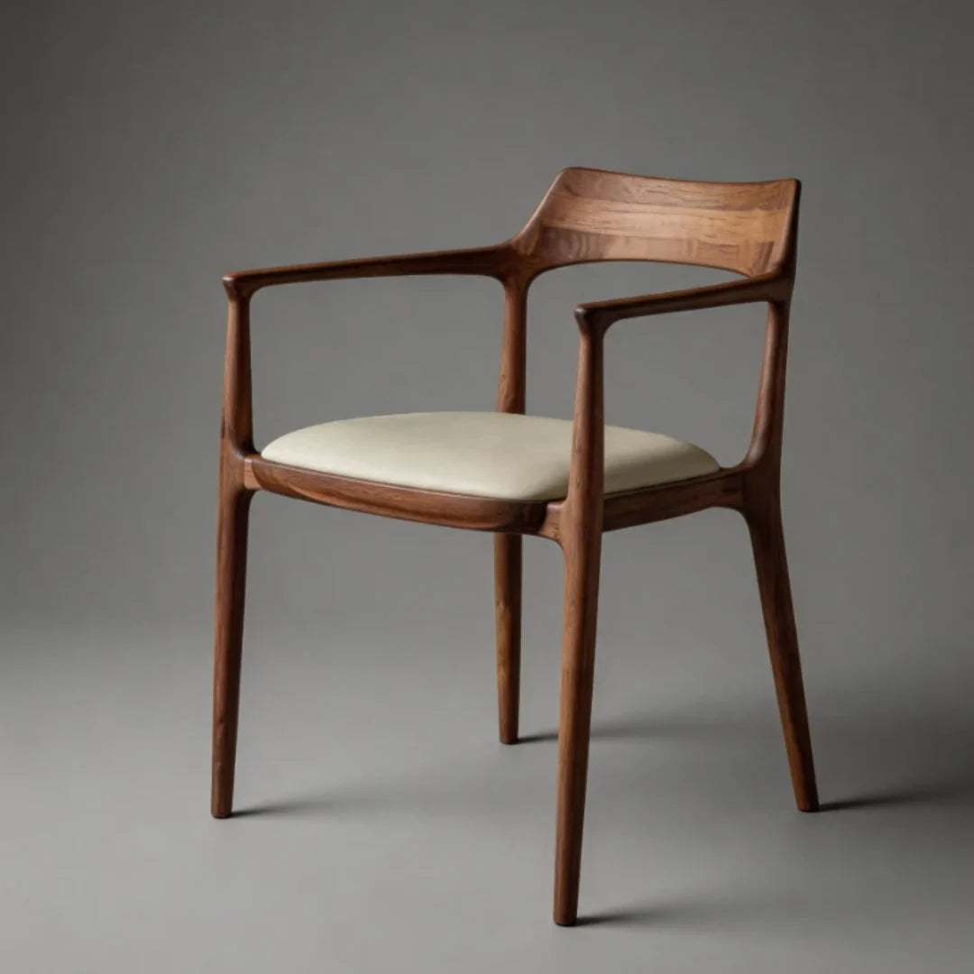 CH18 wood dining chair with curved arms and beige upholstered cushion
