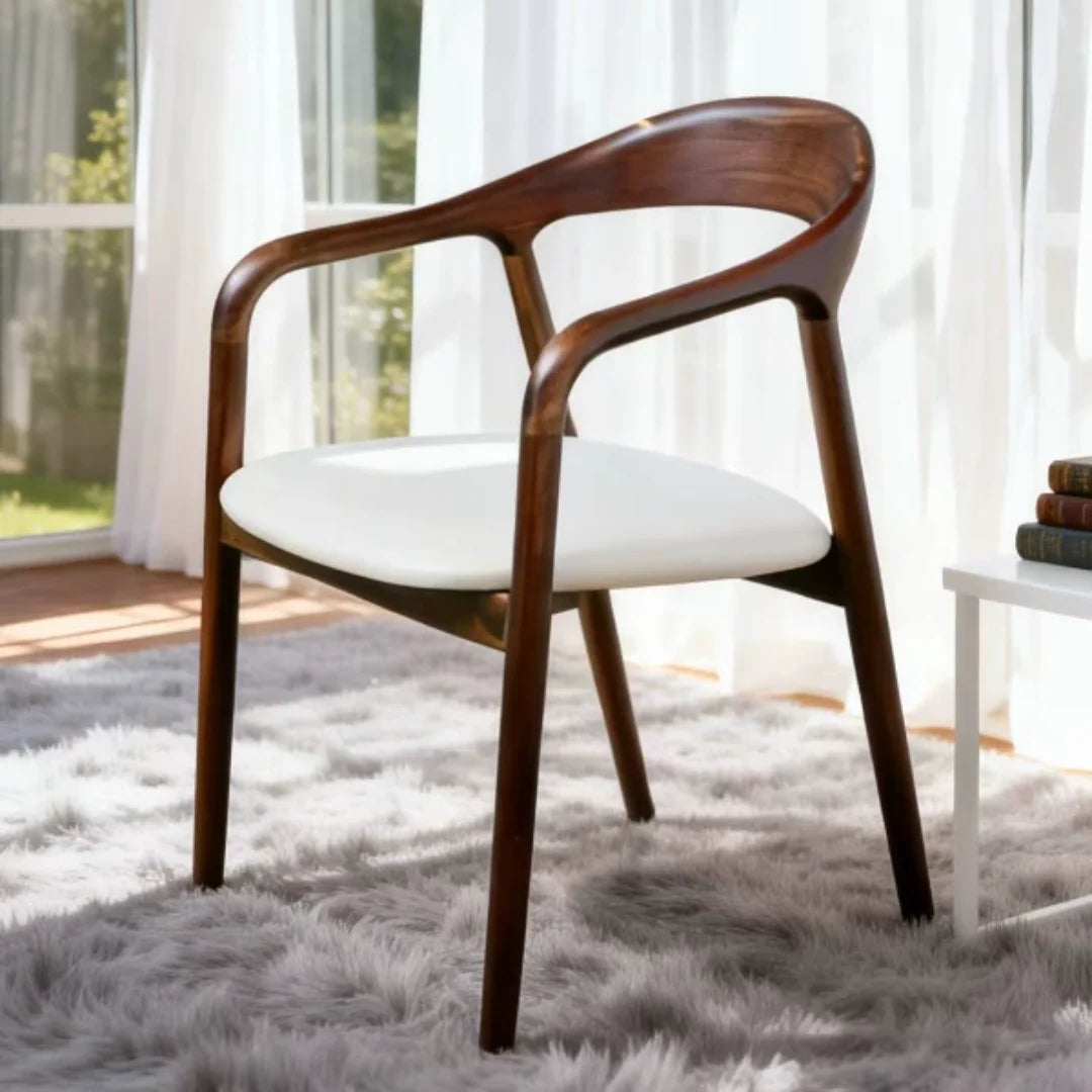 CH21 wood armchair with flowing back rail and white upholstered cushion