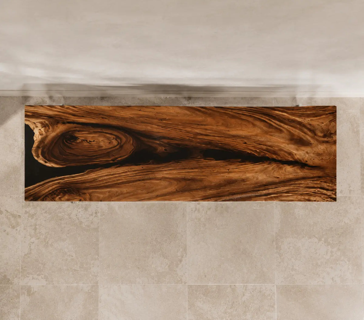CST03 Ember Isle smoky-black walnut console table with a large knot and island-style wood composition