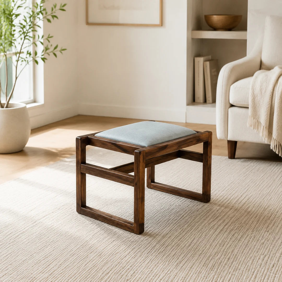 ST02 wood footstool with a light gray cushion and open rectangular base