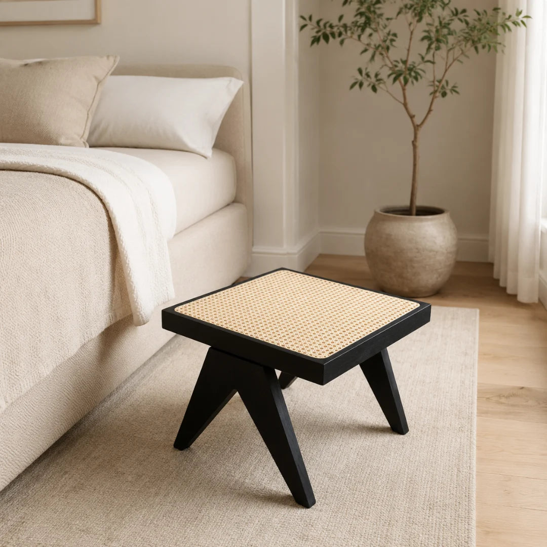 ST03 black low stool with natural cane top and short angled legs